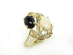 Ladie's Black Coral Oval Ring With Opal